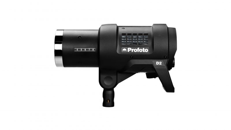 a Profoto D2 head can be seen on a white background. Image is used to illustrate which light to choose for product photography