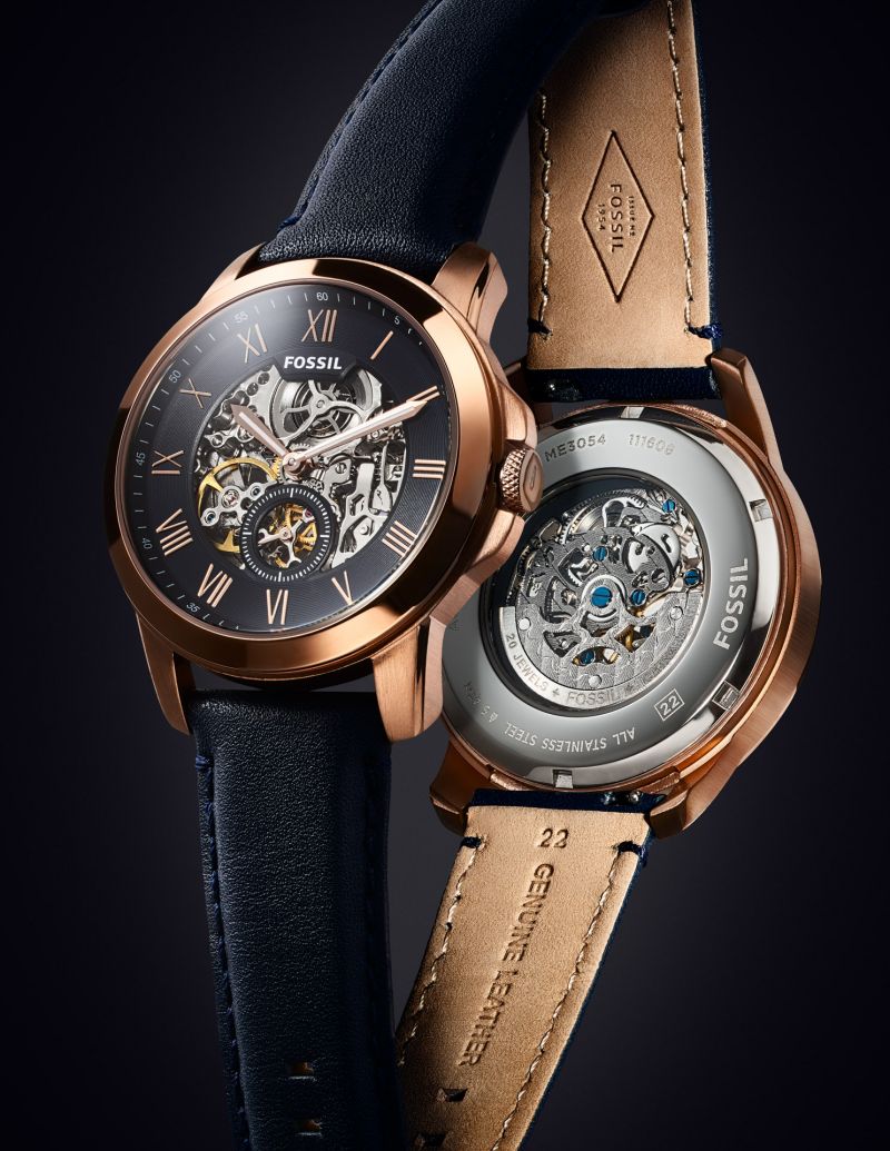 final image of fossil watch depicting a mechanical Fossil watch on a dark background. Photographed by product photographer Max Bridge