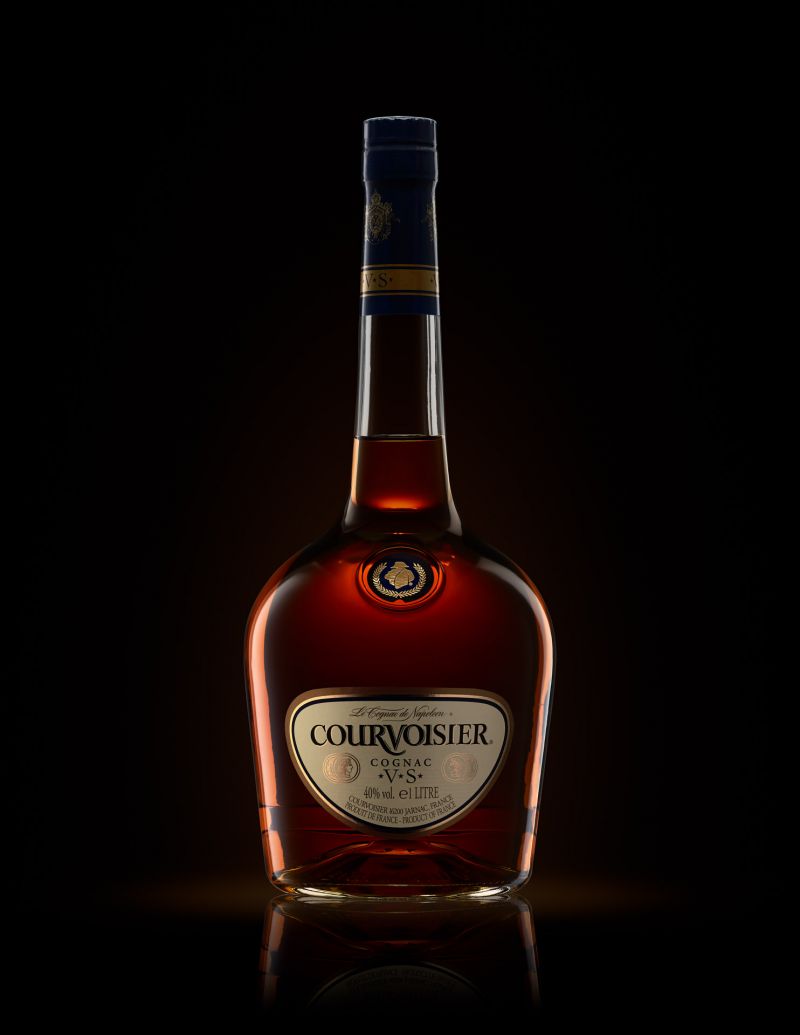 a bottle of courvoisier photographed on a dark background. Use as an exmple of megapixels needed for product photography