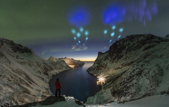 AZURE Vapor Tracers © Yang Sutie (China) - HIGHLY COMMENDED
At the top of fjords in Arctic Norway, the photographer was met with an unknown sky. Was it aliens? Was it the supernatural? He captured a series of photos to record the night and didn’t know until the next day that the colours were actually created by the ‘Auroral Zone Upwelling Rocket Experiment (AZURE)’ from Andøya Space Centre which dispersed gas tracers to probe winds in Earth’s upper atmosphere. 
Nikon D850 camera, 14 mm f/2.8 lens, ISO 1600, 6-second exposure